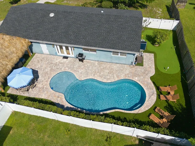 Aerial view of the fenced backyard